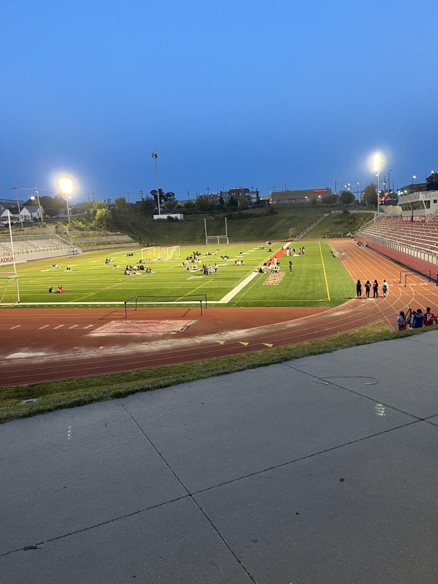 South seniors watch the sun rise at Collin Field. Photo by Courtney Runge.