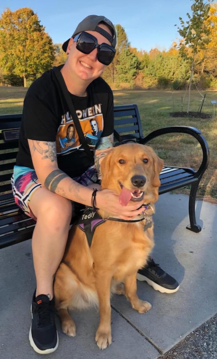 Counselor Jay Graham and Teddy enjoy warmer weather. 