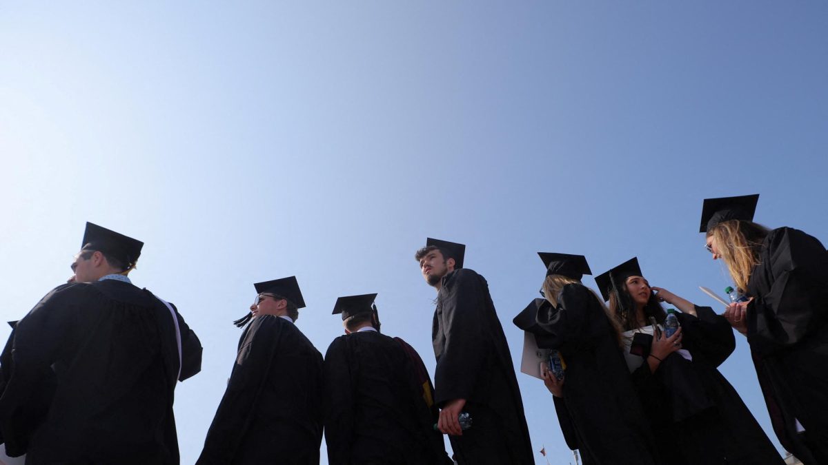 Graduating students gather for Commencement ceremonies at Boston College in Chestnut Hill, Massachusetts, U.S., May 22, 2023.     REUTERS/Brian Snyder