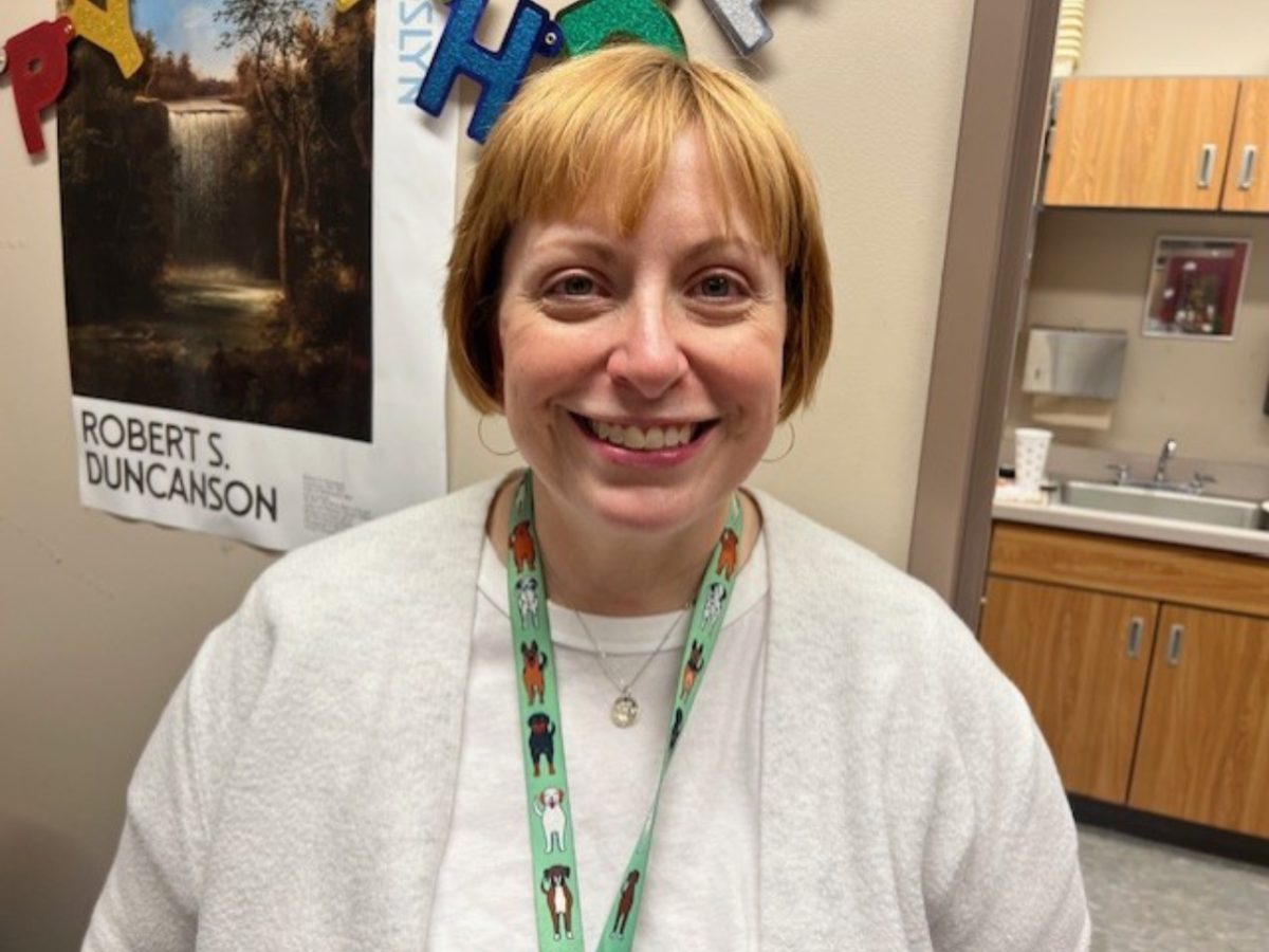 Jennifer Sudduth enjoys junk journaling and playing her dog when not teaching.