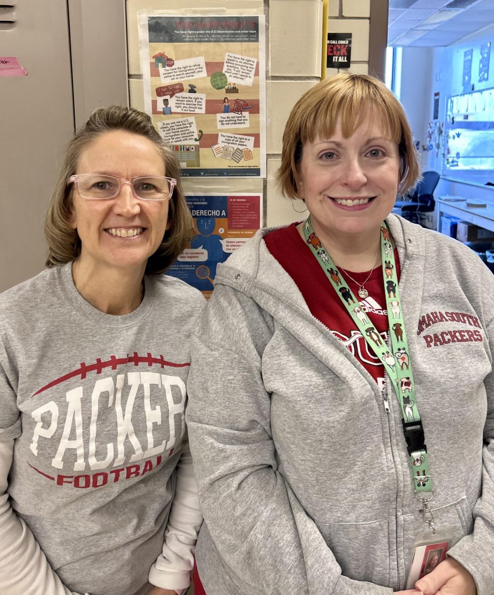 Ellen Augustine, left,  and Jennifer Sudduth smile for a photo together. 