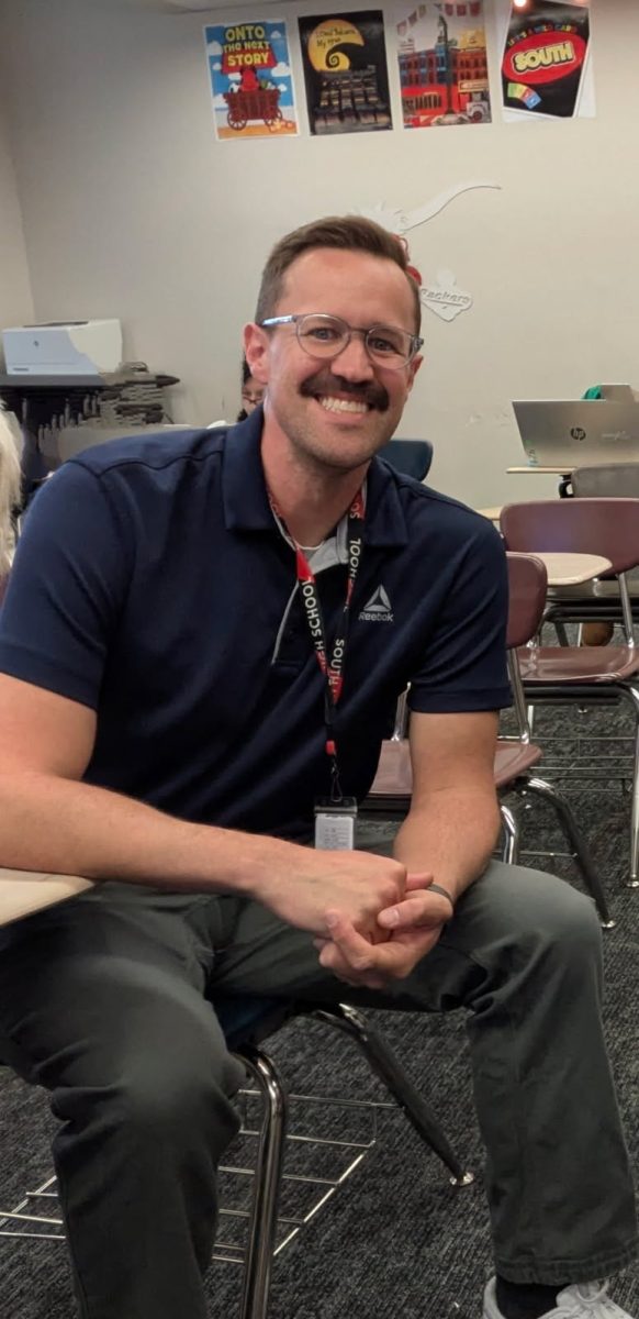 South High English teacher Jacob Andersen wears two hats with English and yearbook.