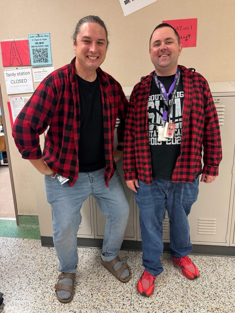 Science teacher Dan Podjenski considers himself a jack of all trades in the sciences. Here, Podjenski and math teacher Adam Byers mug for the camera.