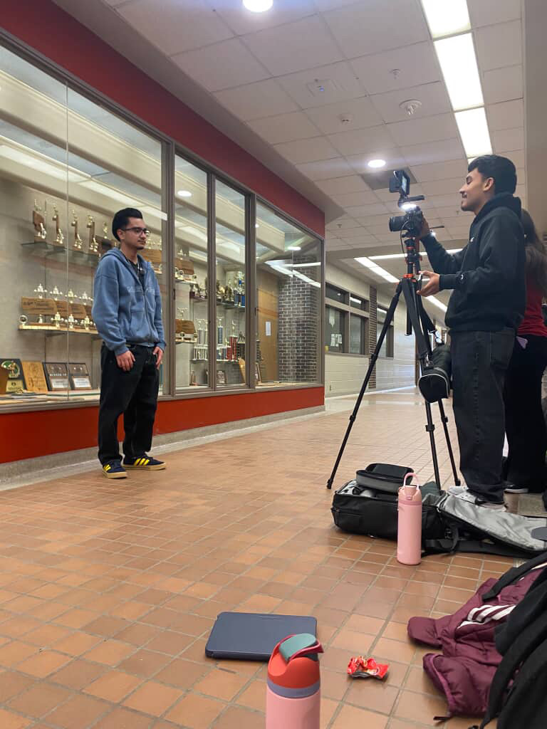 Senior Oscar David Molina films senior Allan Gonzalez Sanchez for the South High Spotlight.