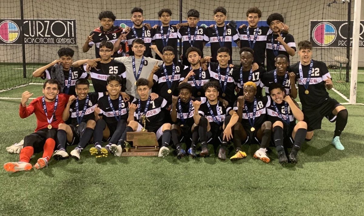 South's 2019 state championship team celebrates after their penalty shootout win.