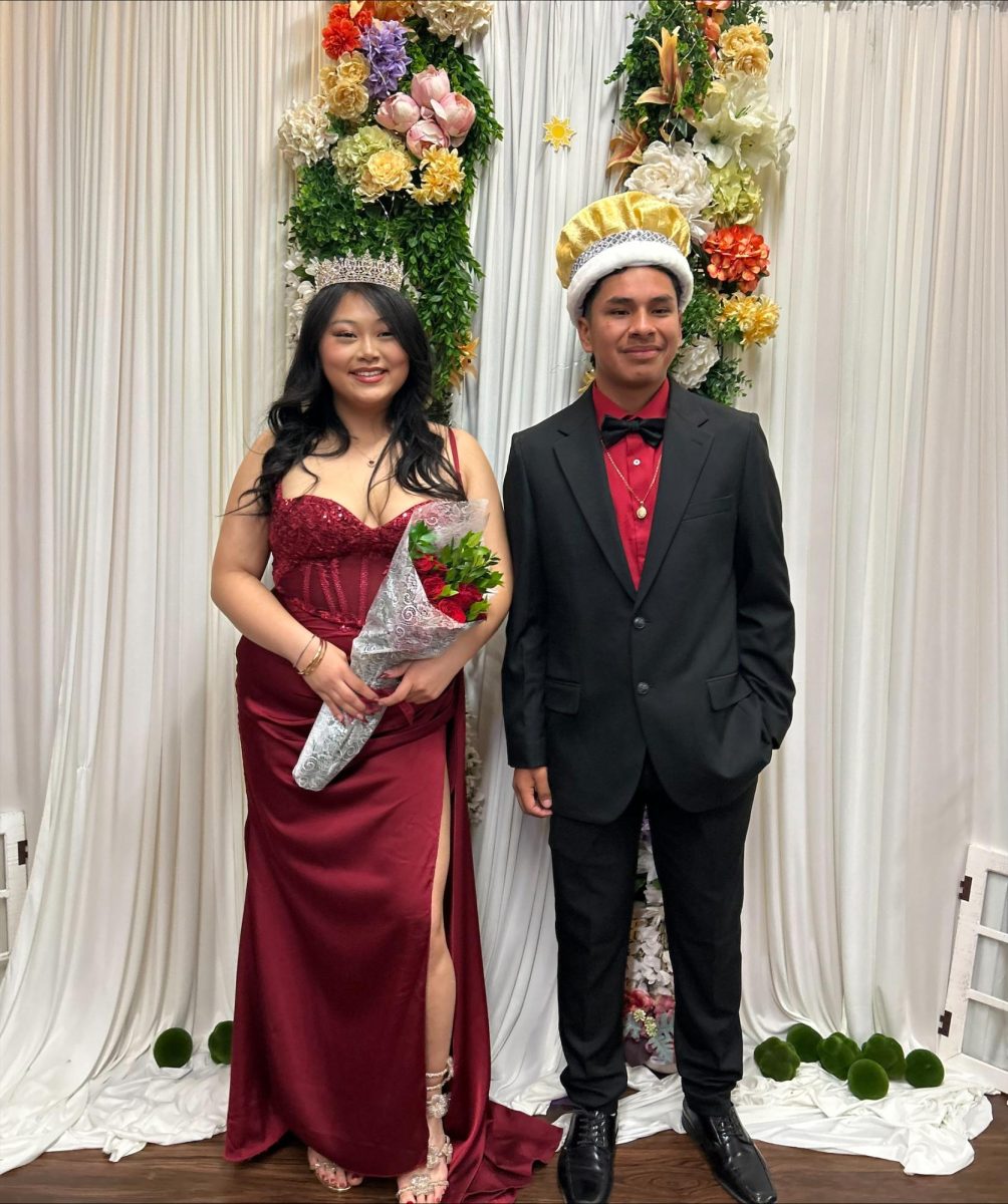 Ava Yang and Hugo Hernandez Lara win their positions as gold royalty at South's March prom.